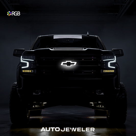 RGB LED grille bowtie glowing white on Chevy Silverado; chrome/black finish, front hero shot