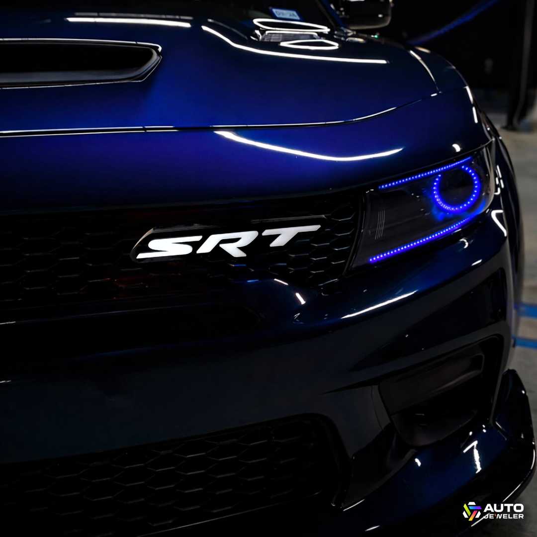 AutoJeweler SRT LED grille emblem illuminated white installed on Dodge Charger front grille