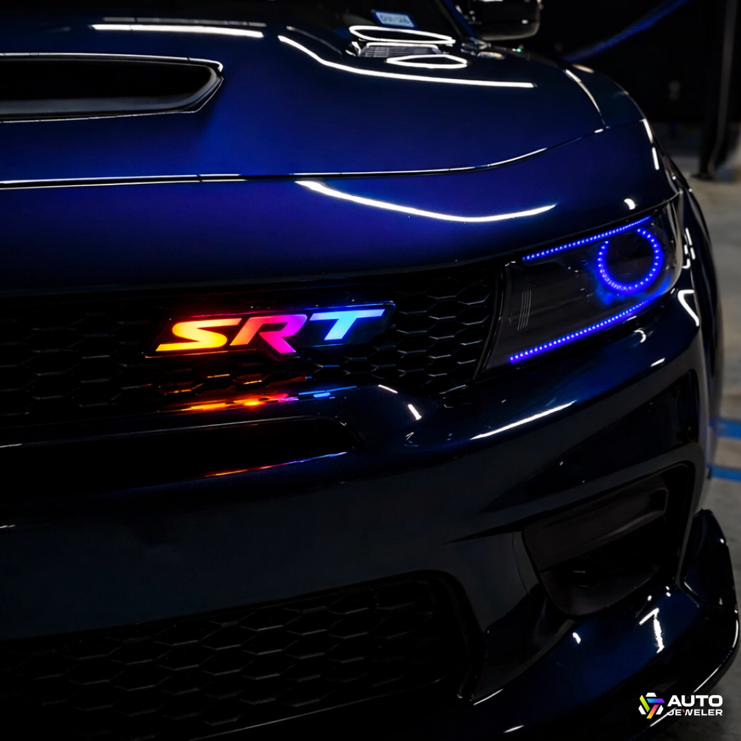 AutoJeweler RGB Flow Series SRT LED grille emblem installed on Dodge Charger with multicolor lighting