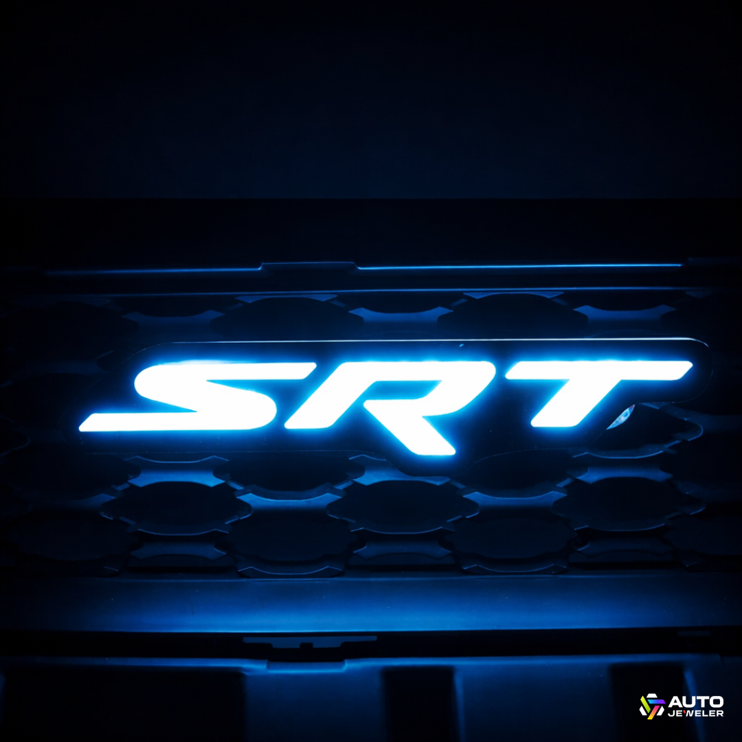 AutoJeweler RGB Flow Series SRT LED grille emblem glowing blue installed in Dodge Charger grille