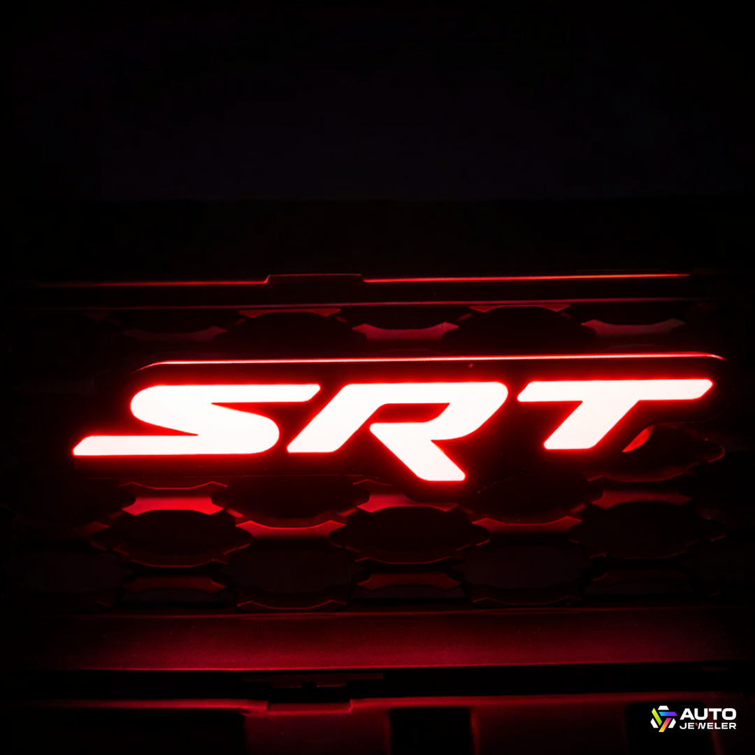 AutoJeweler RGB Flow Series SRT LED grille emblem glowing red installed in Dodge Charger grille