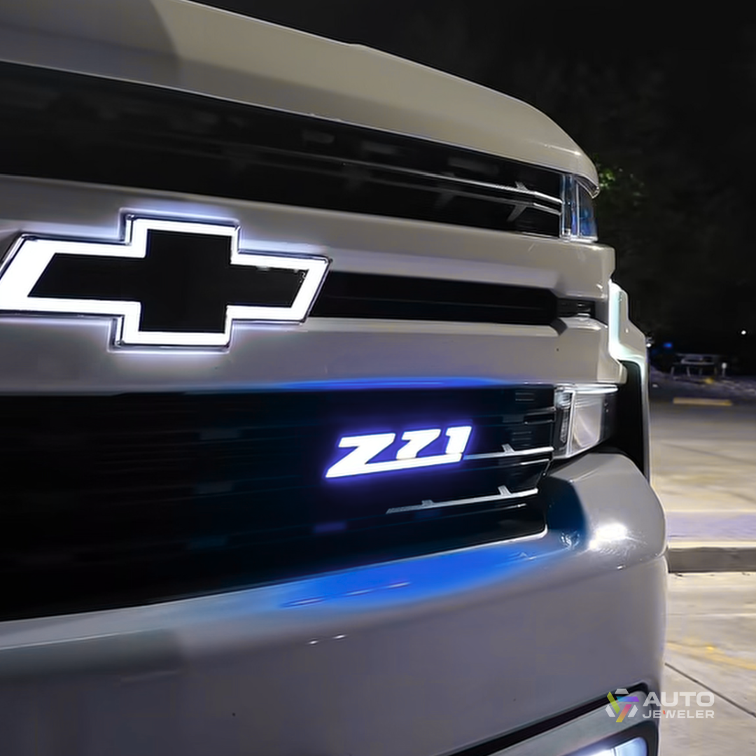 Z71 LED grille emblem installed on Chevy truck showing bright blue illumination mode for OEM style appearance