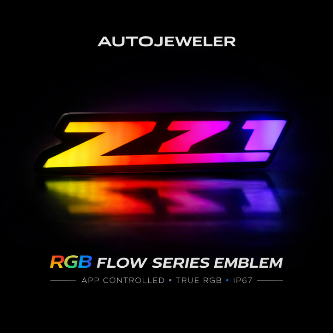 AutoJeweler RGB Z71 Flow Series LED grille emblem hero image with vibrant multicolor lighting on dark background