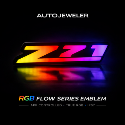 AutoJeweler RGB Z71 Flow Series LED grille emblem hero image with vibrant multicolor lighting on dark background