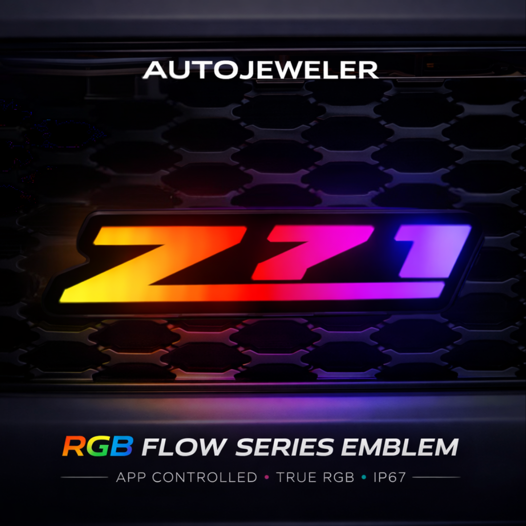 AutoJeweler RGB Z71 Flow Series LED grille emblem installed on Chevrolet mesh grille with vibrant multicolor lighting and app controlled RGB effects