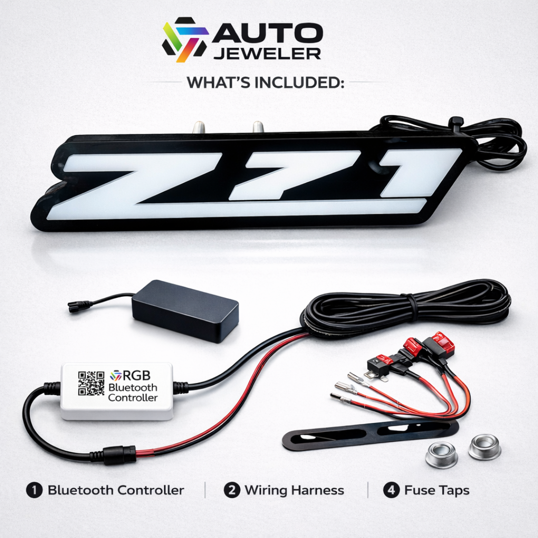 AutoJeweler RGB Z71 Flow Series LED grille emblem kit contents showing emblem, Bluetooth controller, wiring harness, fuse taps, and mounting hardware