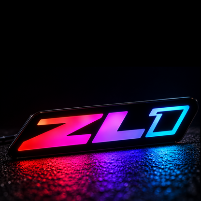 Camaro ZL1 Gen 2 Flow Series LED emblem illuminated in red, pink, purple and blue RGB colors
