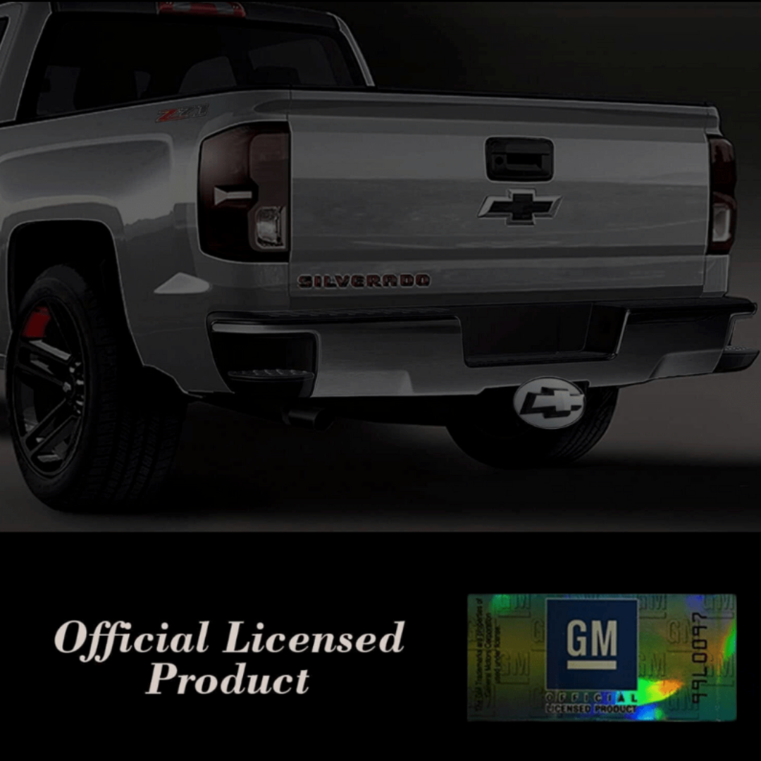 Chevy truck with installed chrome LED hitch cover illuminated on rear receiver officially licensed product