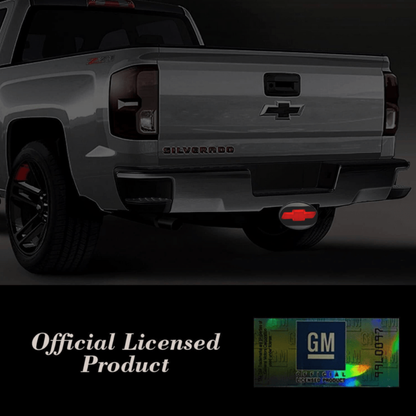 Official licensed Chevy LED hitch cover installed on Chevrolet Silverado truck illuminated