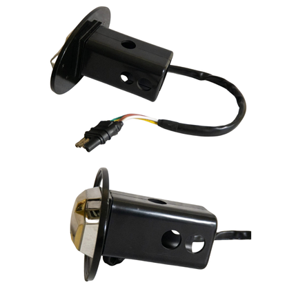 Rear view of Chevrolet LED hitch receiver cover showing mounting bracket and 4-pin wiring connector