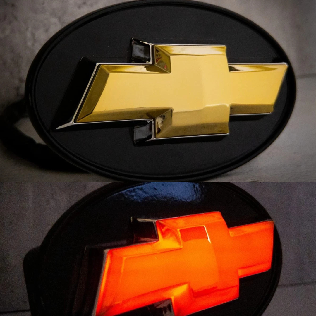 Chevrolet LED hitch receiver cover showing unlit chrome bowtie and illuminated red LED bowtie comparison