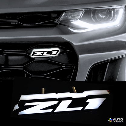 Close-up of a car grille with 'ZL1' logo and 'Auto Jeveler' branding.