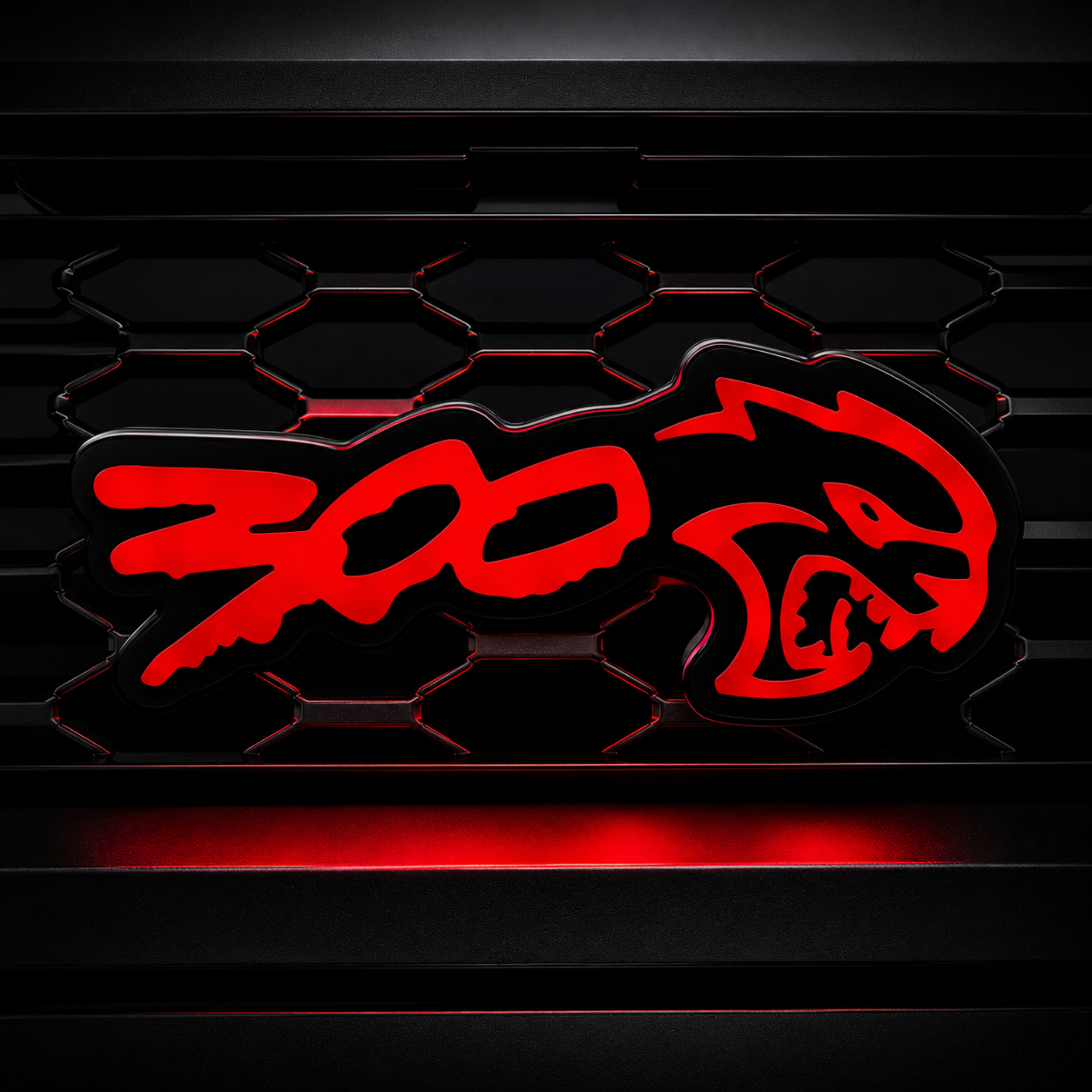300 Hellcat V2 Style Flow Series LED grille emblem glowing red on a black mesh grille for Chrysler 300 custom builds.