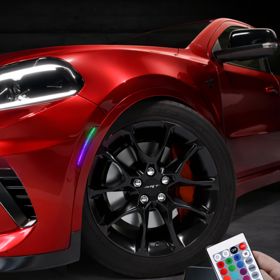 Close-up of RGB LED front side marker light installed on Dodge Durango fender with smoked lens