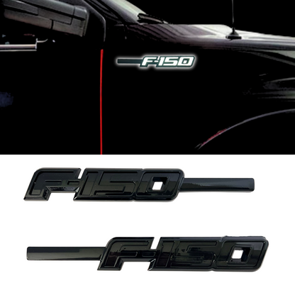 Gloss black F-150 LED fender emblem illuminated at night on a black truck, with close-up daytime view of emblem set.