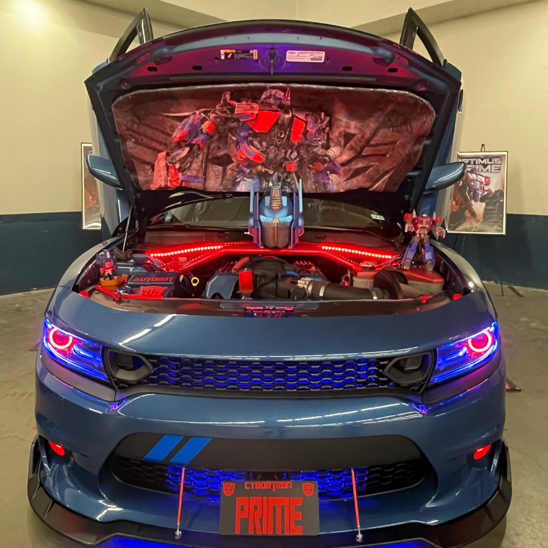 Custom car show vehicle featuring Flow Series RGB engine bay lighting kit