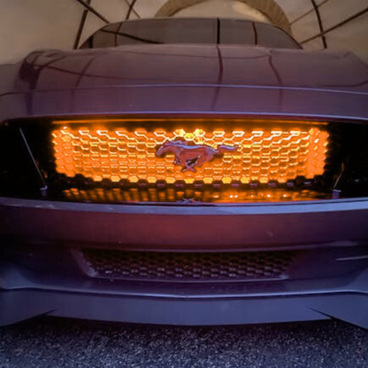 Flow Series RGB grille lighting installed on Ford Mustang with amber lighting effect