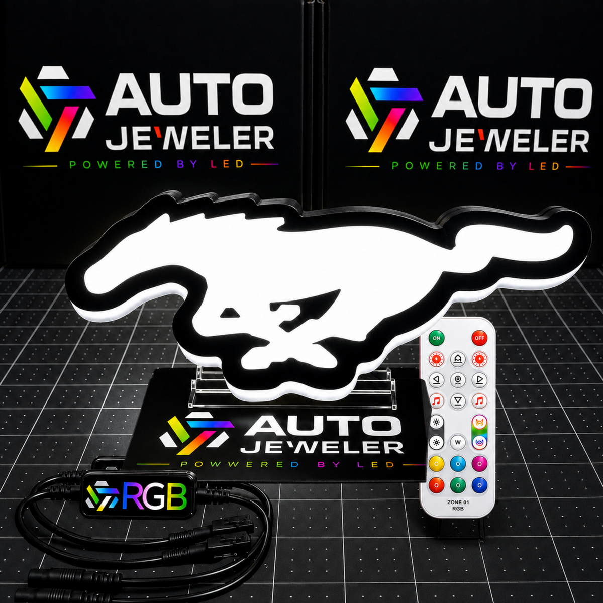  Ford Mustang Pony RGB LED grille emblem illuminated white with RGB controller, wiring harness, and handheld remote.