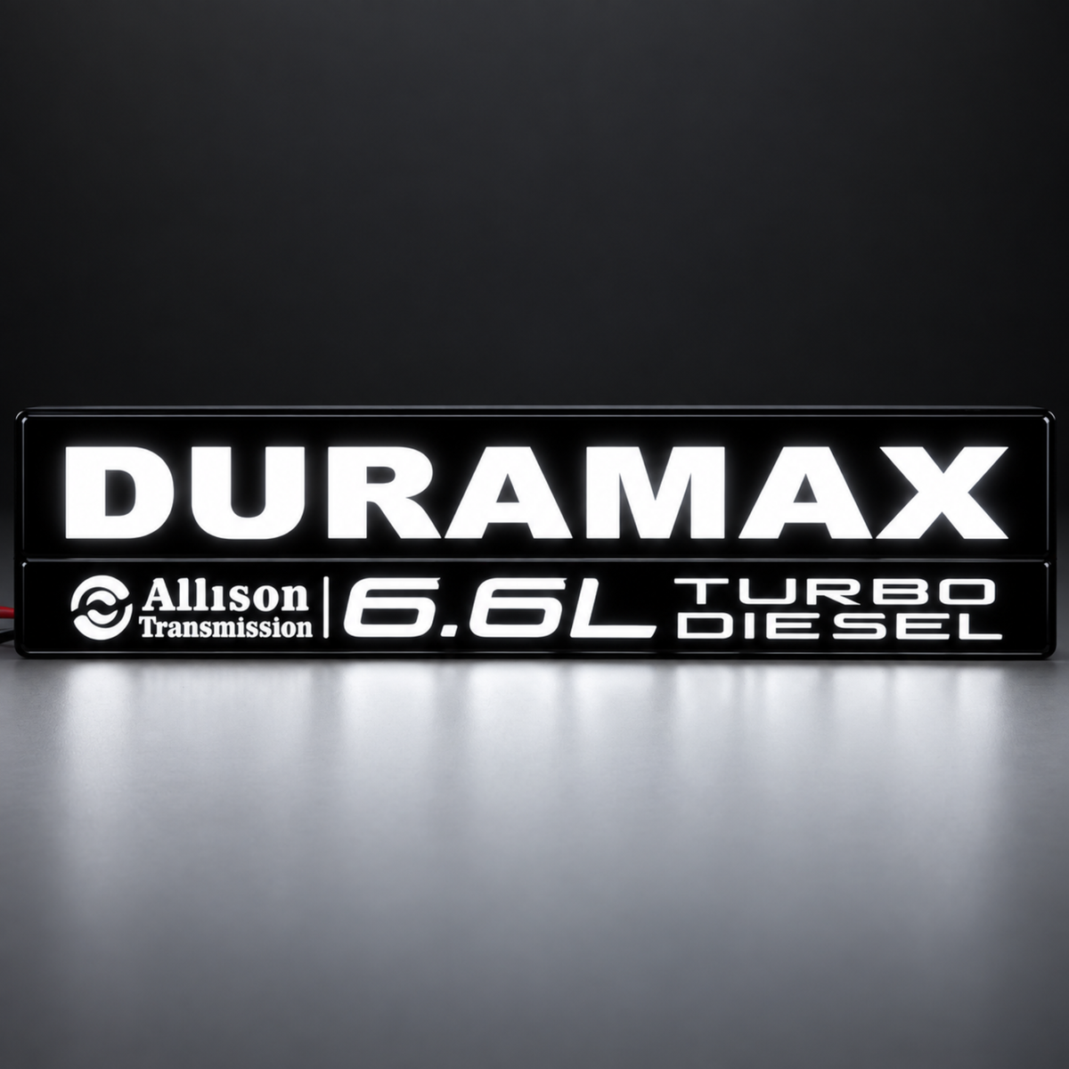 Pair of GMC Sierra HD Duramax 6.6L LED fender badges with black housings