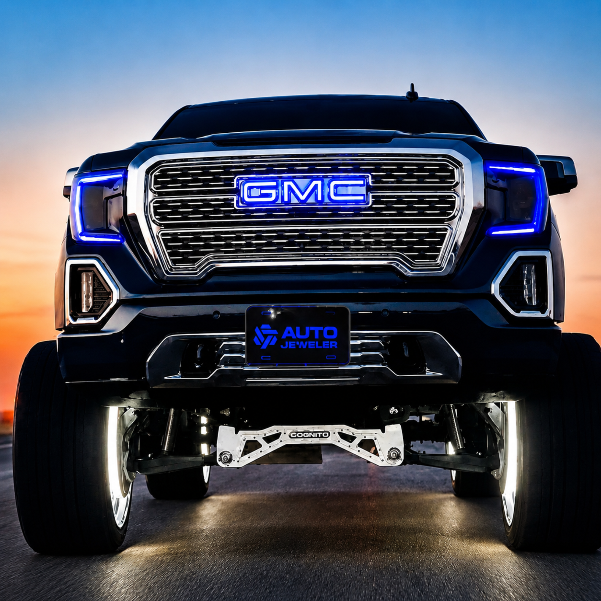 GMC Sierra with blue RGBW LED illuminated grille emblem installed on the front grille.