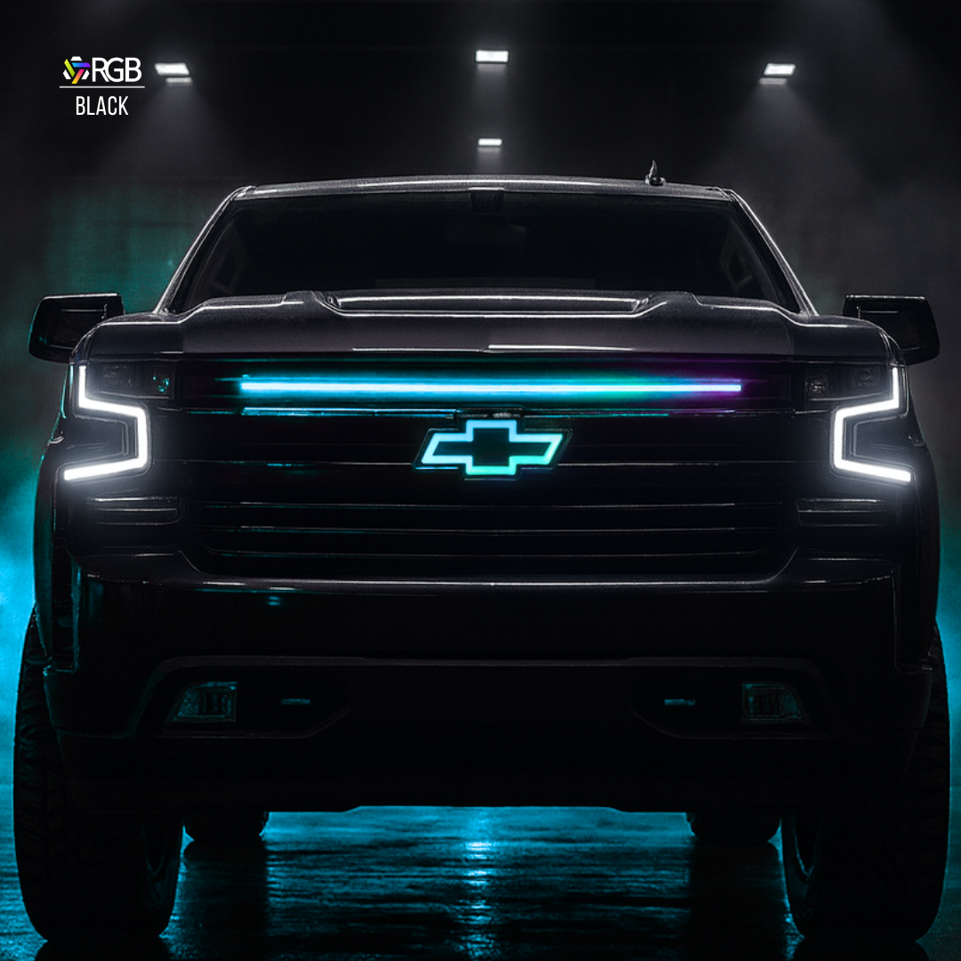 Chevrolet truck with glowing blue logo in a dark setting