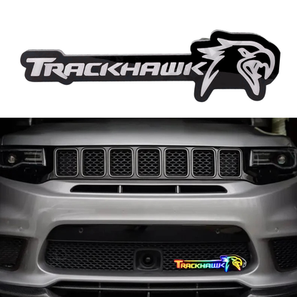 Jeep Trackhawk RGB Flow Series LED grille emblem shown as standalone product and installed on front grille, Bluetooth app-controlled illuminated badge
