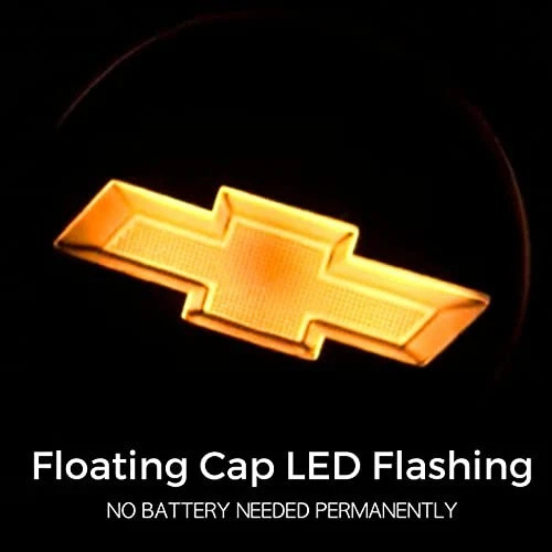 Close-up of illuminated Chevy bowtie on floating LED wheel center cap—battery-free operation.