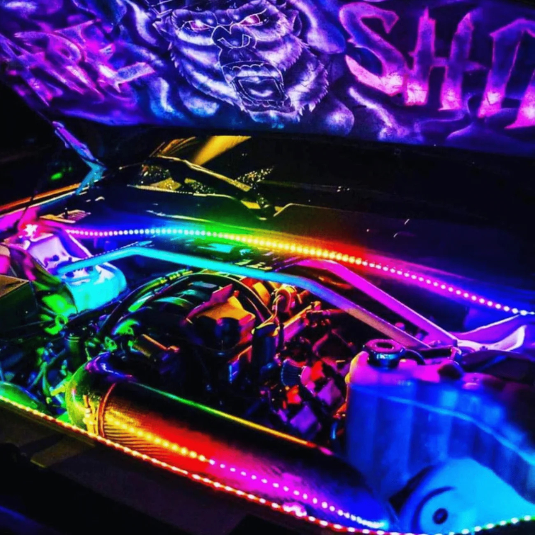 Flow Series RGB engine bay lighting kit installed under hood with multicolor effects