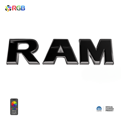 2019–2023 RAM 1500 black lighted grille emblem with RGB LED lighting, Mopar Official Licensed Product, AutoJeweler branding, remote app control