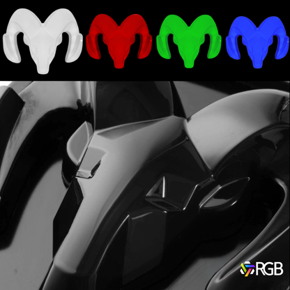 RAM 1500 LED grille emblem color options in white, red, green, and blue, with close-up of black Mopar grille emblem – RGB AutoJeweler branding.