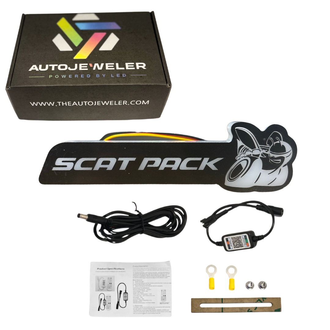 AutoJeweler Scat Pack RGB Flow Series LED emblem kit with controller, wiring harness, install hardware, instructions, and branded box.