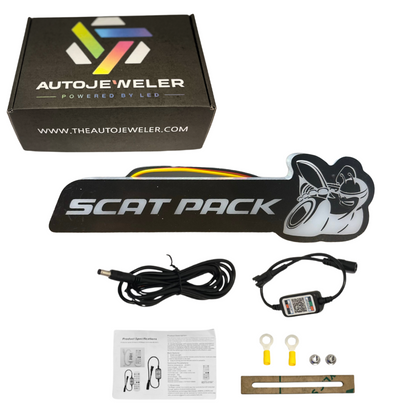 AutoJeweler Scat Pack RGB Flow Series LED emblem kit with controller, wiring harness, install hardware, instructions, and branded box.