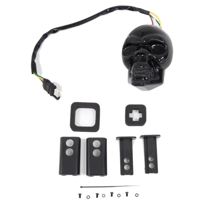 Skull LED trailer hitch cover kit contents including black skull cover, wiring harness, mounting adapters and hardware for 1-1/4 and 2 inch receivers