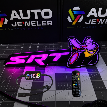 SRT Bee Flow Series RGB LED emblem illuminated pink and purple with RGB controller and handheld remote