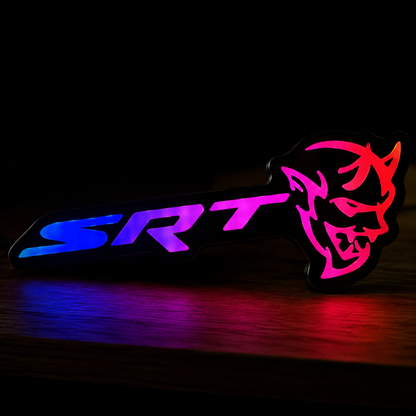 SRT Demon RGB LED emblem illuminated with purple and blue flow effect showing vibrant custom lighting modes.