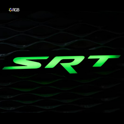 LED Dodge SRT grille emblem glowing Green on a black grille.