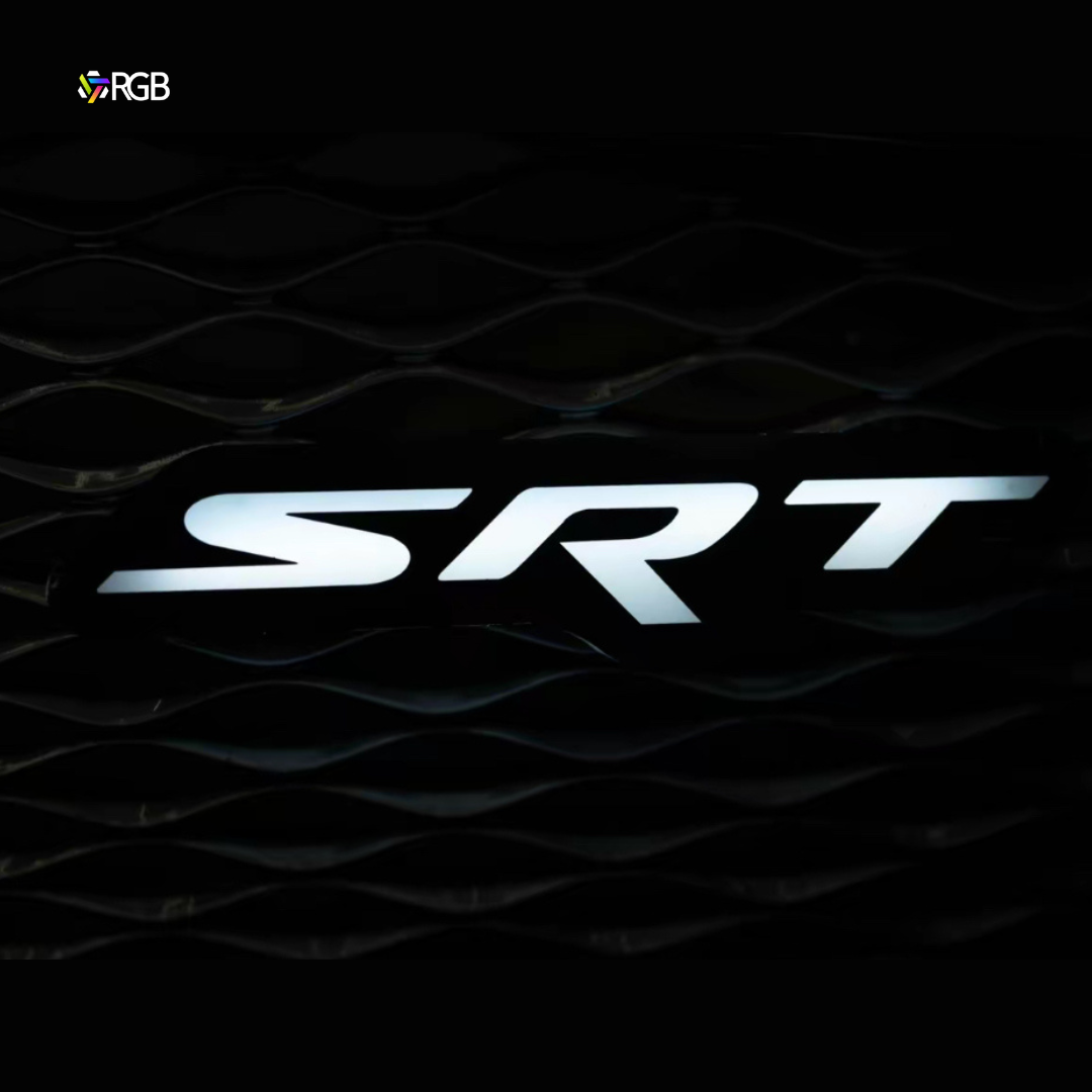 LED SRT logo glowing white on front grille with AutoJeweler RGB icon.
