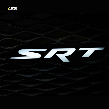 LED SRT logo glowing white on front grille with AutoJeweler RGB icon.