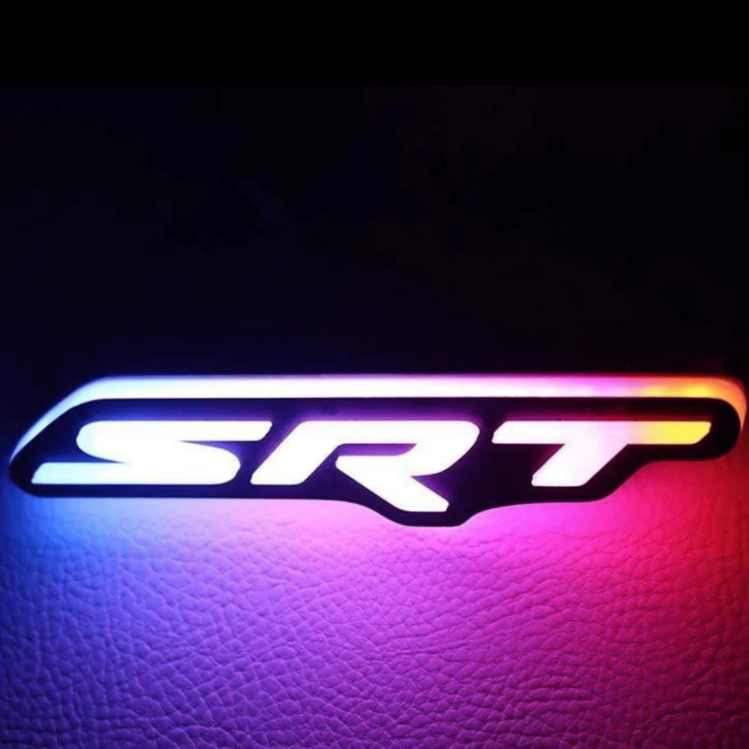 SRT illuminated LED badge glowing with purple and blue RGB Flow-Series effects.
