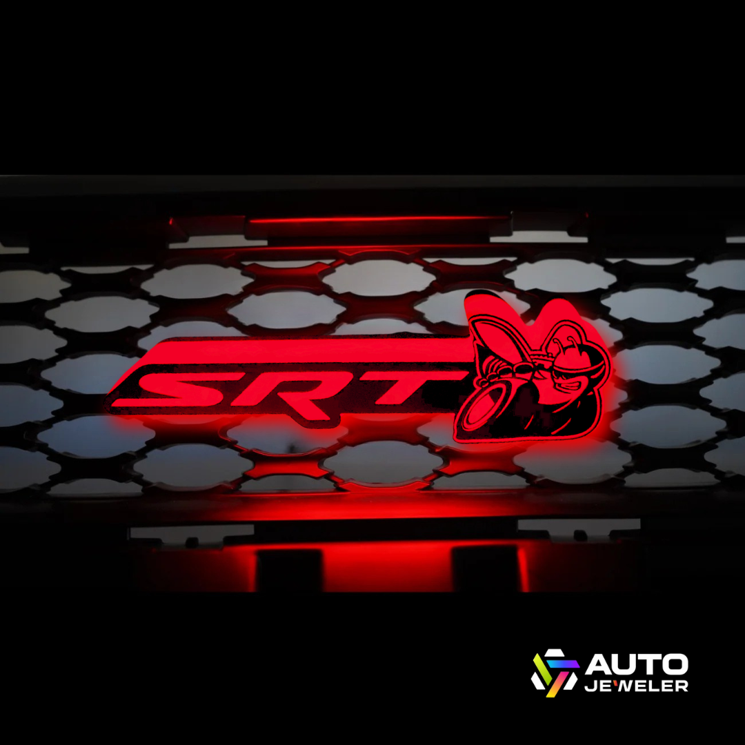 SRT Scat Bee LED emblem glowing in bright red.