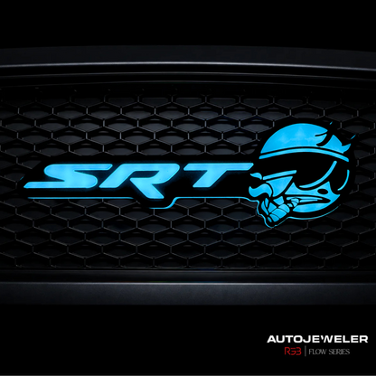 SRT Smoking Bee LED grille emblem installed on black honeycomb grille illuminated in bright blue static lighting mode.
