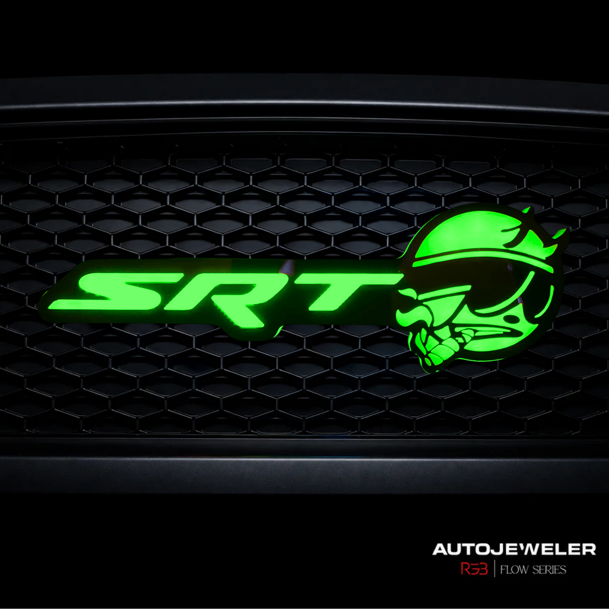 SRT Smoking Bee LED grille emblem installed on black honeycomb grille illuminated in bright green static lighting mode.