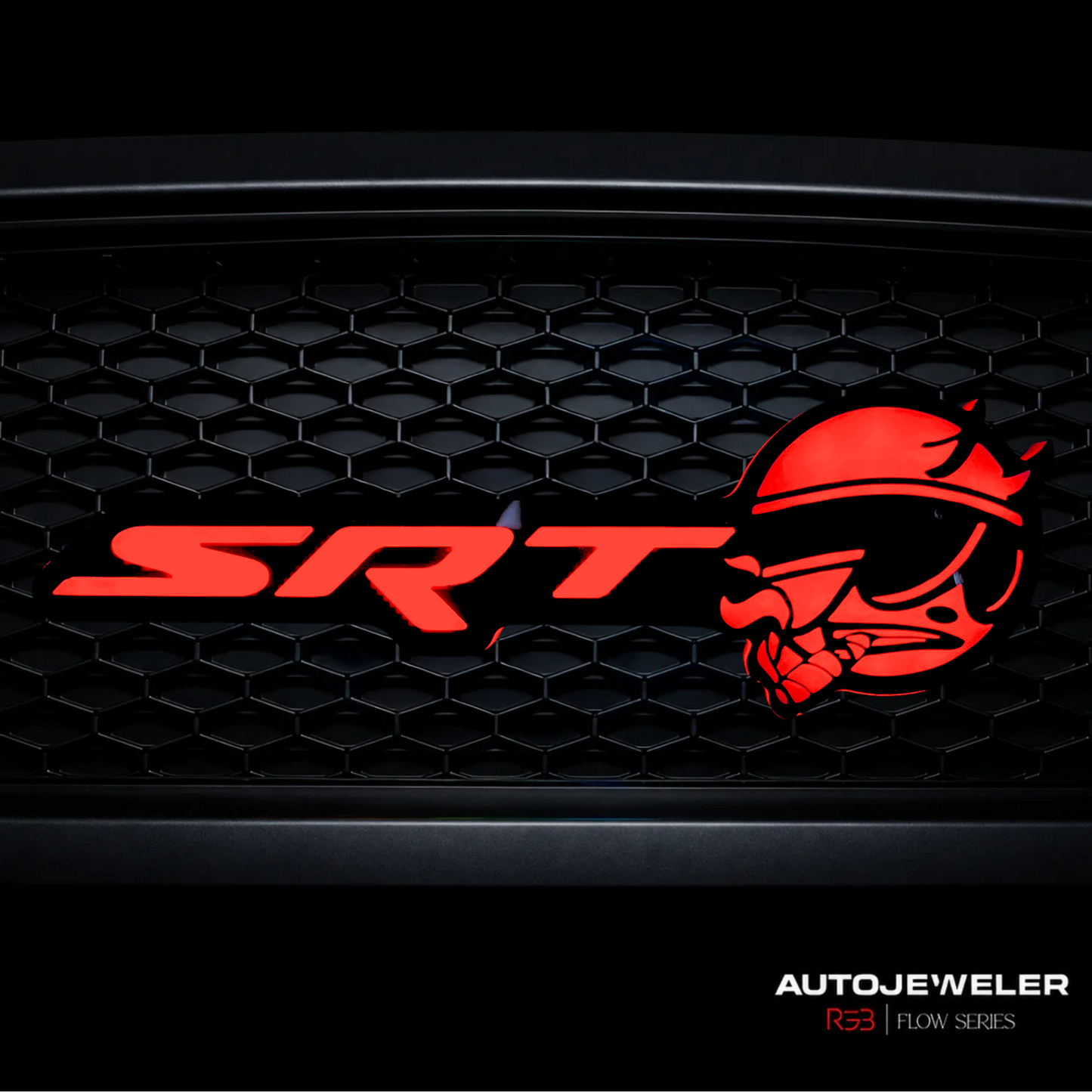 SRT Smoking Bee LED grille emblem installed on black honeycomb grille illuminated in bright red static lighting mode.